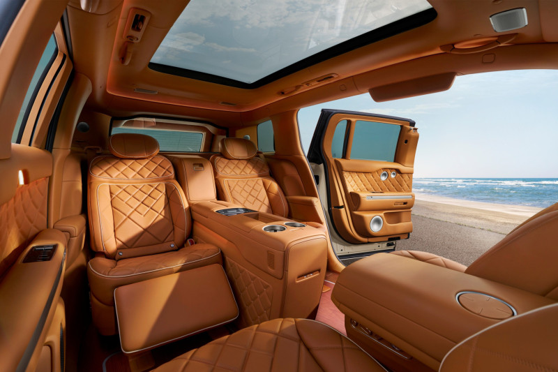 Genesis GV90 Executive Suite interior in tan leather with reclined rear seats and panoramic roof