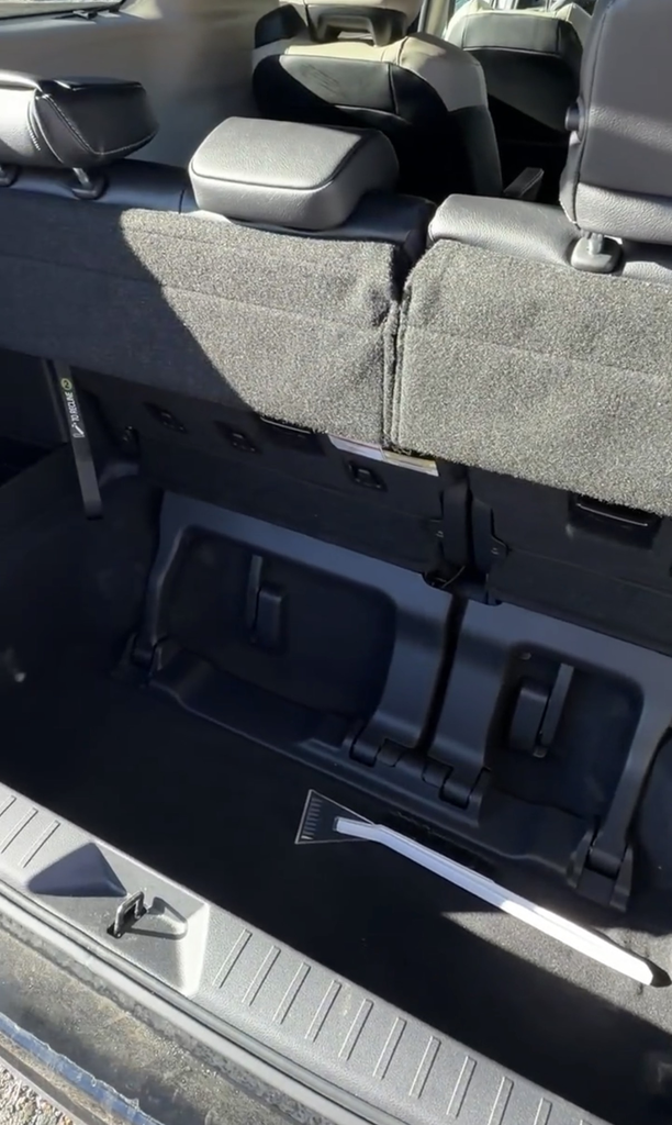 Deep trunk well of the 2025 Toyota Sienna with the third-row seats up
