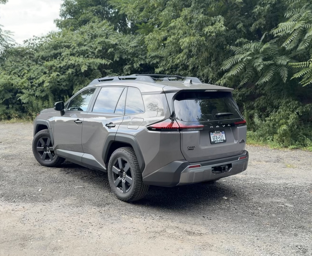 2026 Toyota RAV4 Woodland rear three-quarter view showing the flat roofline carried back to the trunk
