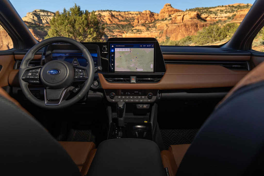 2026 Subaru Outback Wilderness interior with the portrait touchscreen, copper stitching, and two-tone dashboard