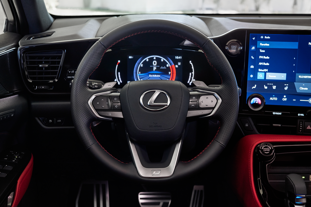 Lexus NX F Sport steering wheel, digital cluster, and touchscreen with red leather trim