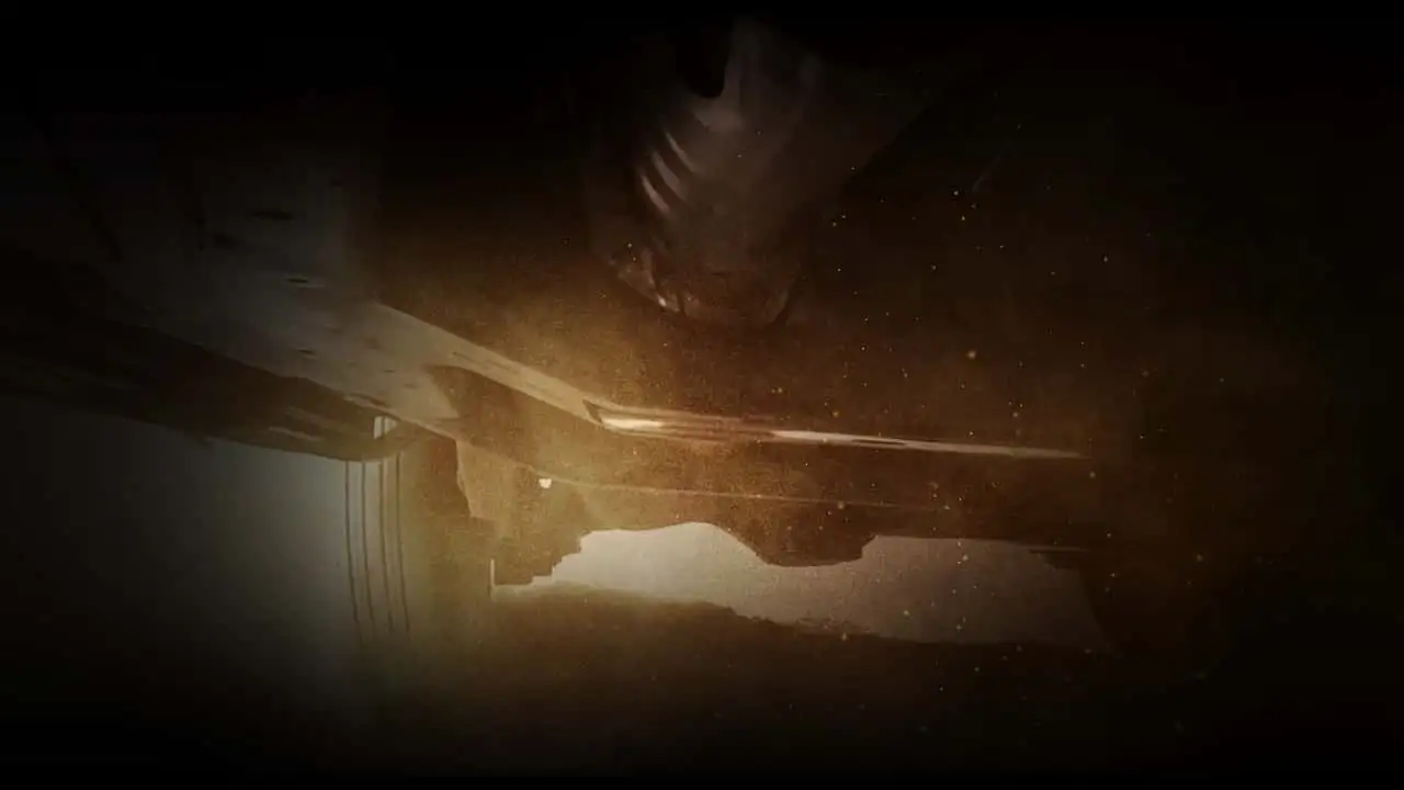 New Mitsubishi Pajero teaser showing the underbody and ladder frame through dust
