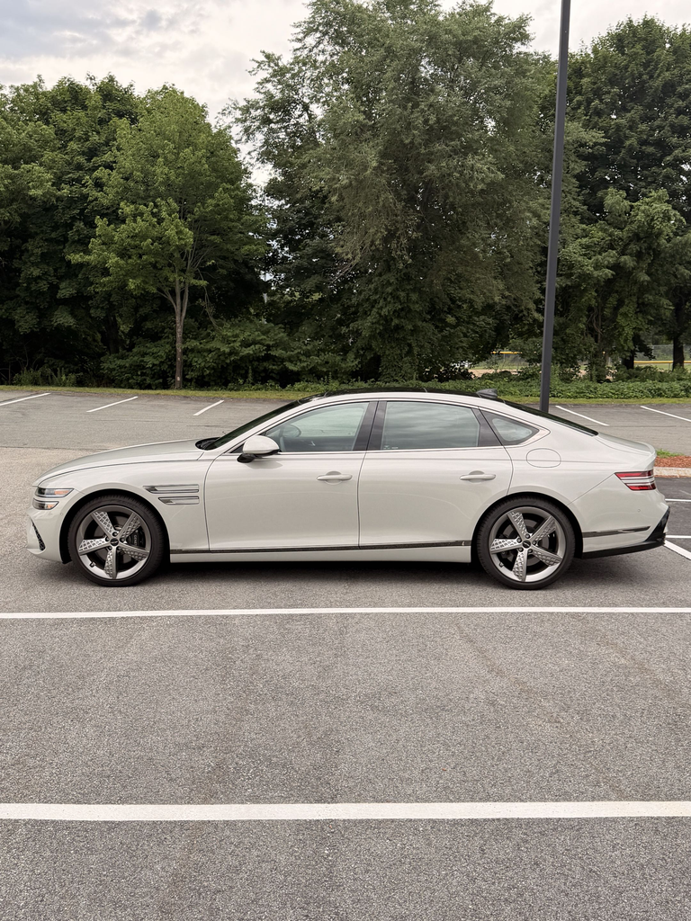 2025 Genesis G80 side profile showing the fastback roofline