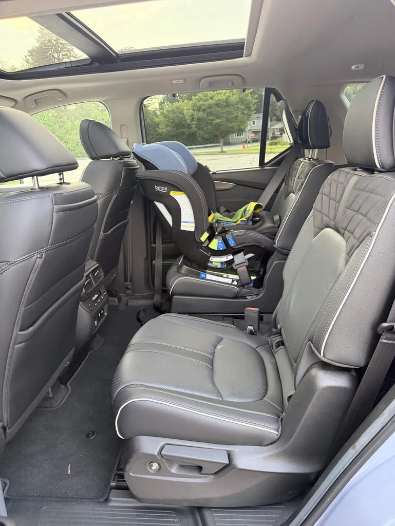 Britax car seat installed on the second-row captain\u0027s chair of the 2026 Honda Pilot Elite under the panoramic roof