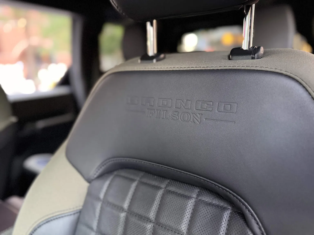 Bronco Filson embossed leather seatback with quilted perforated leather inserts