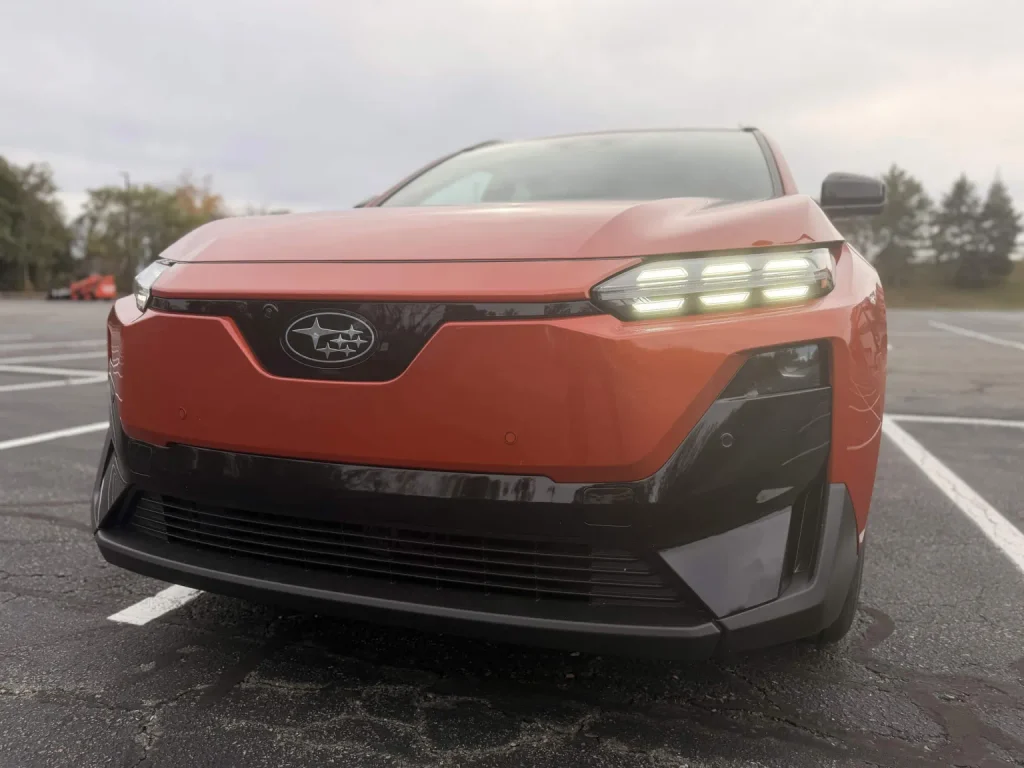 2026 Subaru Uncharted Sport front end close up with lit headlights