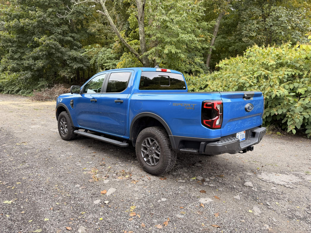 2026 Ford Ranger XLT in blue, rear three-quarter view