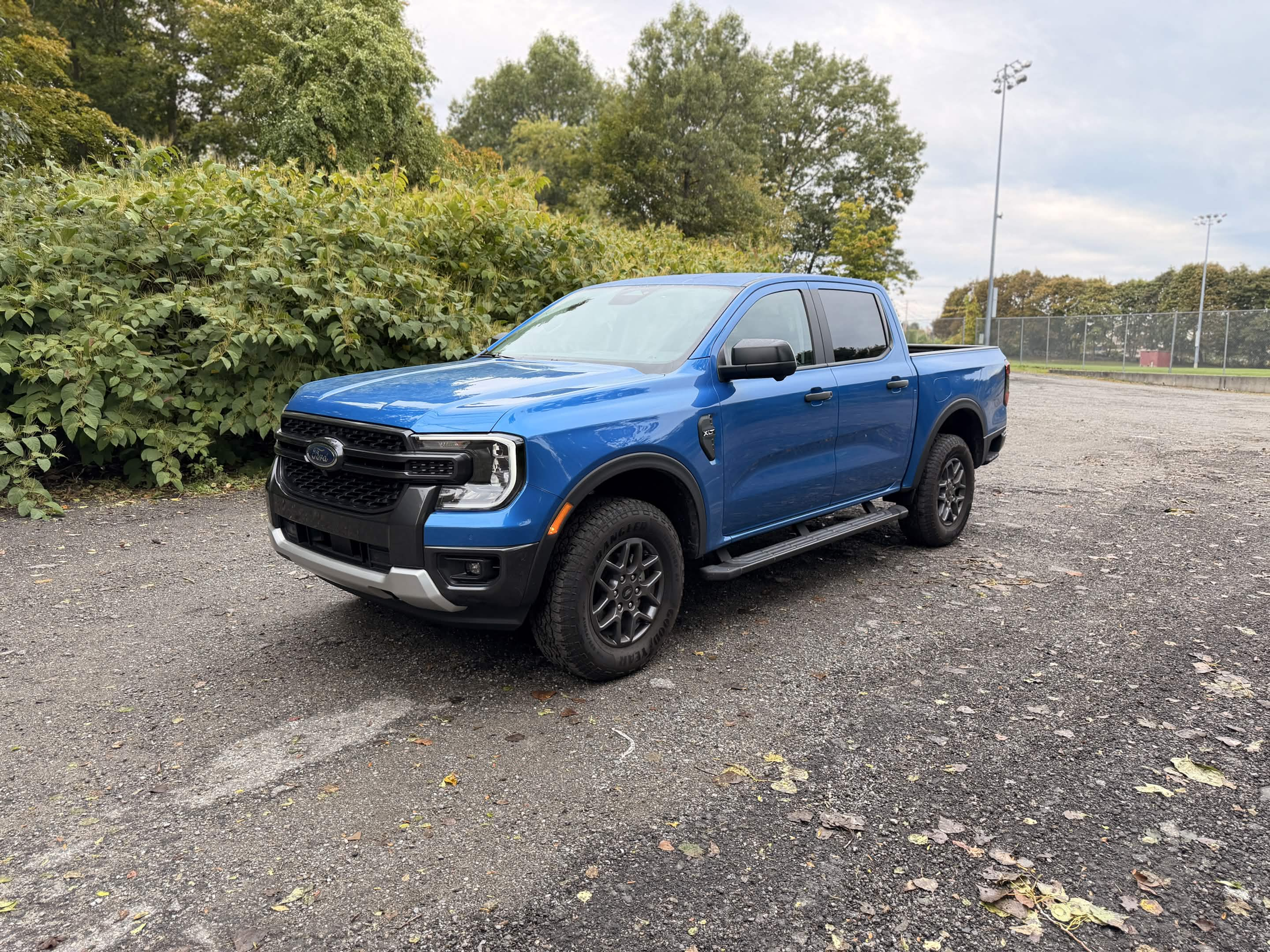 2026 Ford Ranger XLT in blue, front three-quarter view