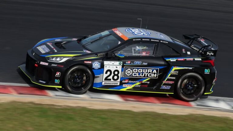 Toyota mid-engine coupe prototype racing at Super Taikyu Okayama, side view of car 28