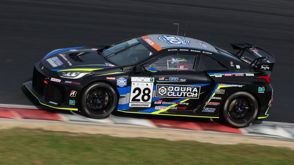 Toyota mid-engine coupe prototype racing at Super Taikyu Okayama, side view of car 28